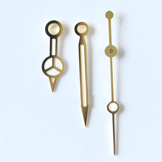 Vintage-style 12.5mm GoldenTrim watch hands with blue-green lume for 3135 movement.