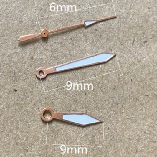 Rose gold trimmed green lume watch hands, 9x9x6mm, compatible with Miyota 2035 quartz movement.