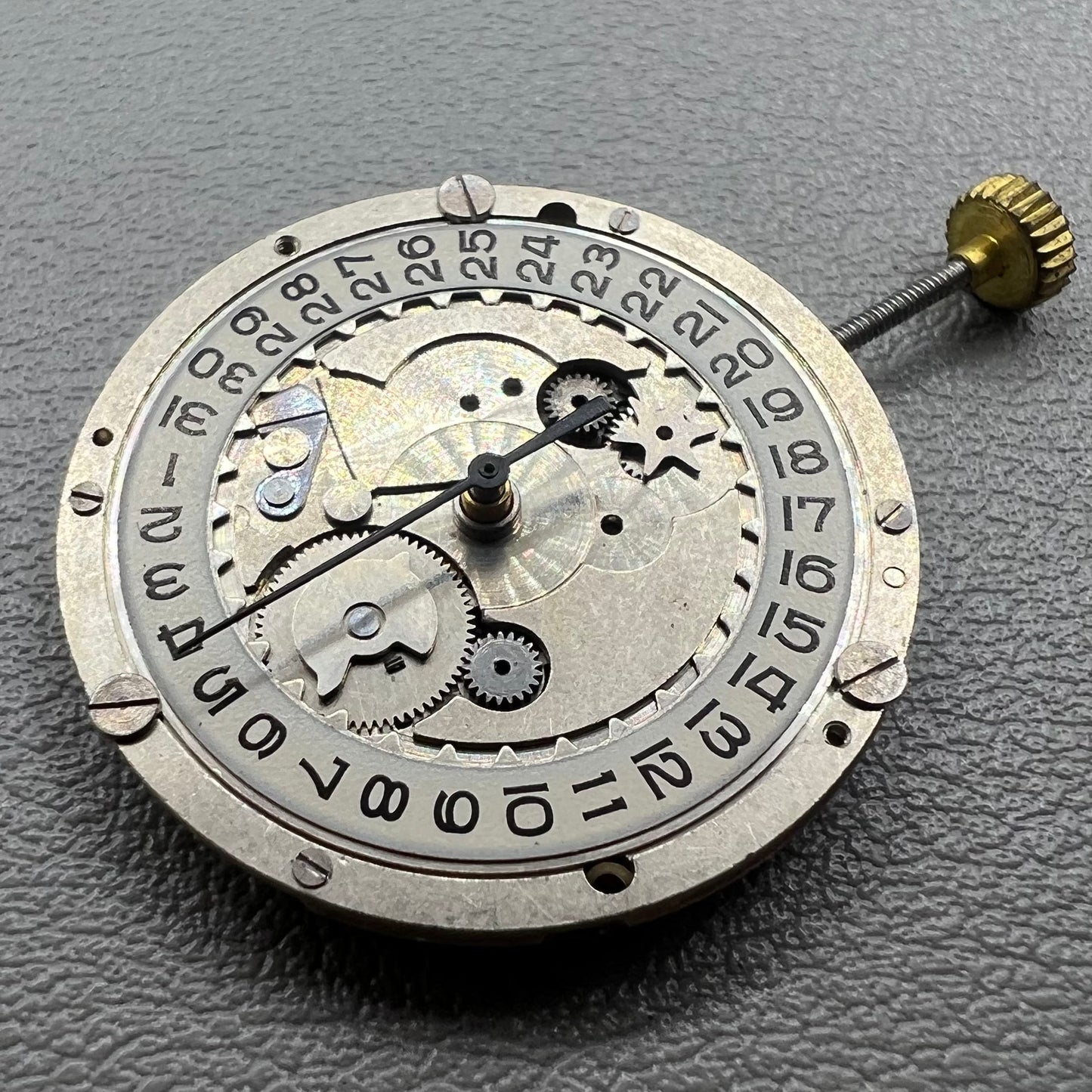 Swiss P-2460 quartz watch movement with 3 hands, precise timekeeping for watch repairs and accessories.
