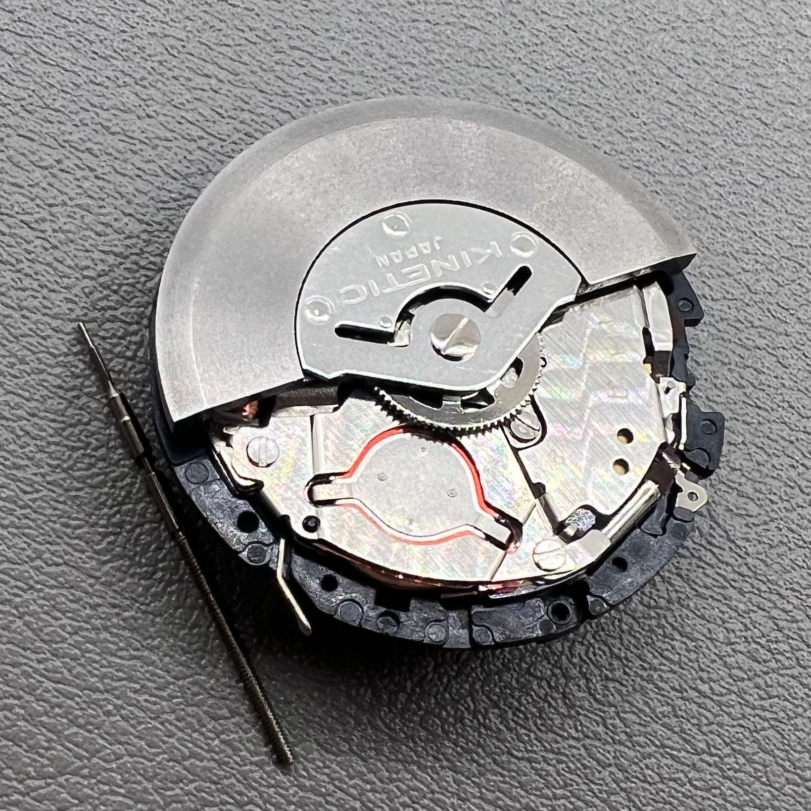 Original Japan Seiko 5M85A watch movement close-up, precise quartz mechanism for durable timekeeping.