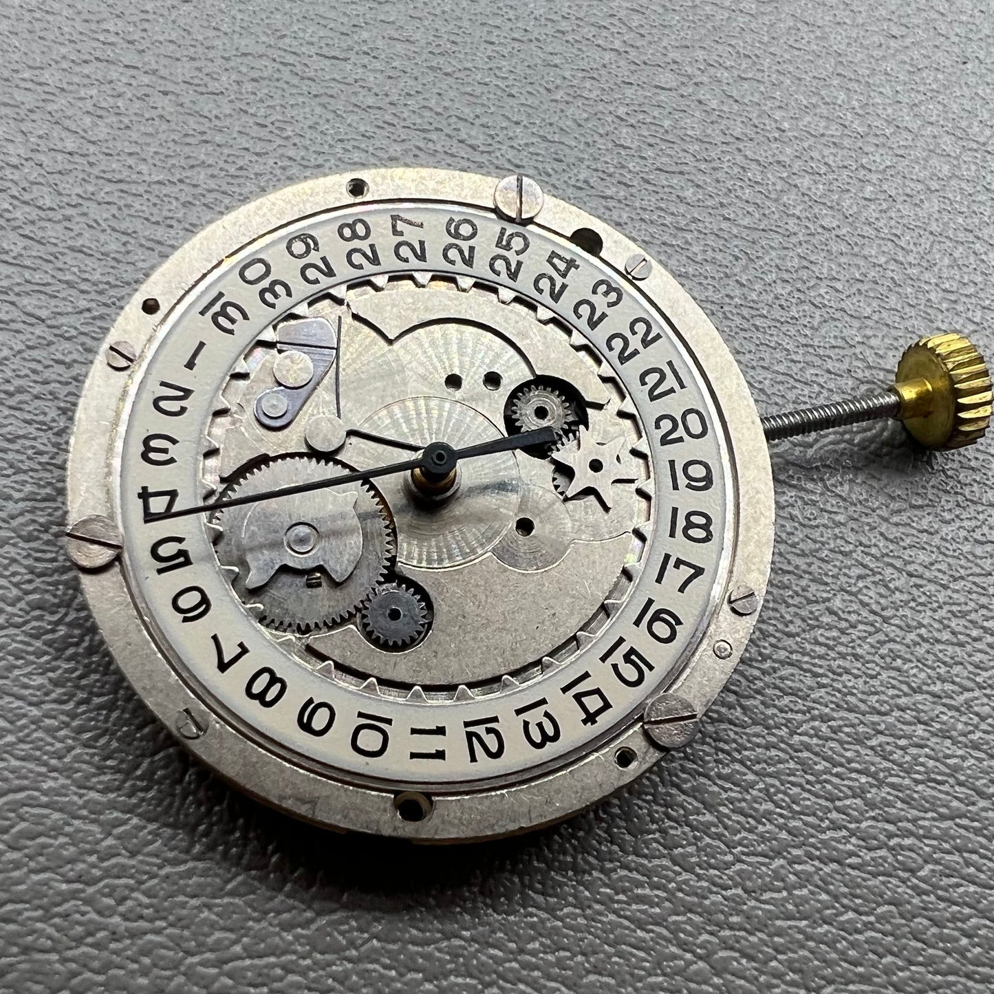 Swiss P-2460 quartz watch movement with 3 hands, precise timekeeping for watch repairs and accessories.