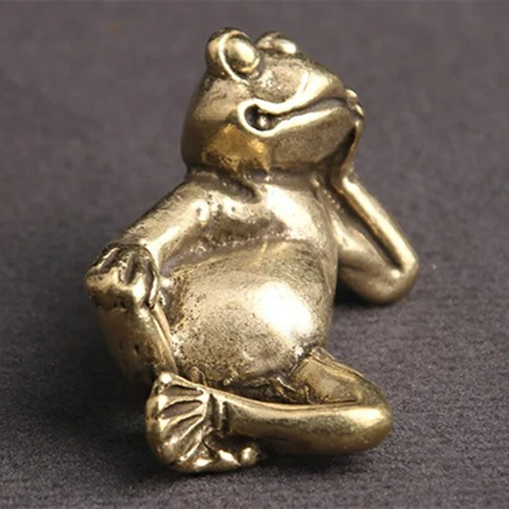Hand-carved solid copper sleeping frog trinket in vintage bronze finish, perfect for watch accessory display.