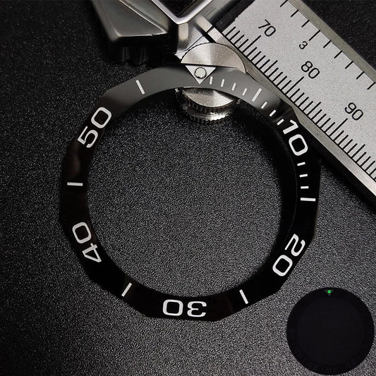 Sloping luminous ceramic bezel insert 42.3x33.3mm for automatic watch replacement, precise fit and durability.