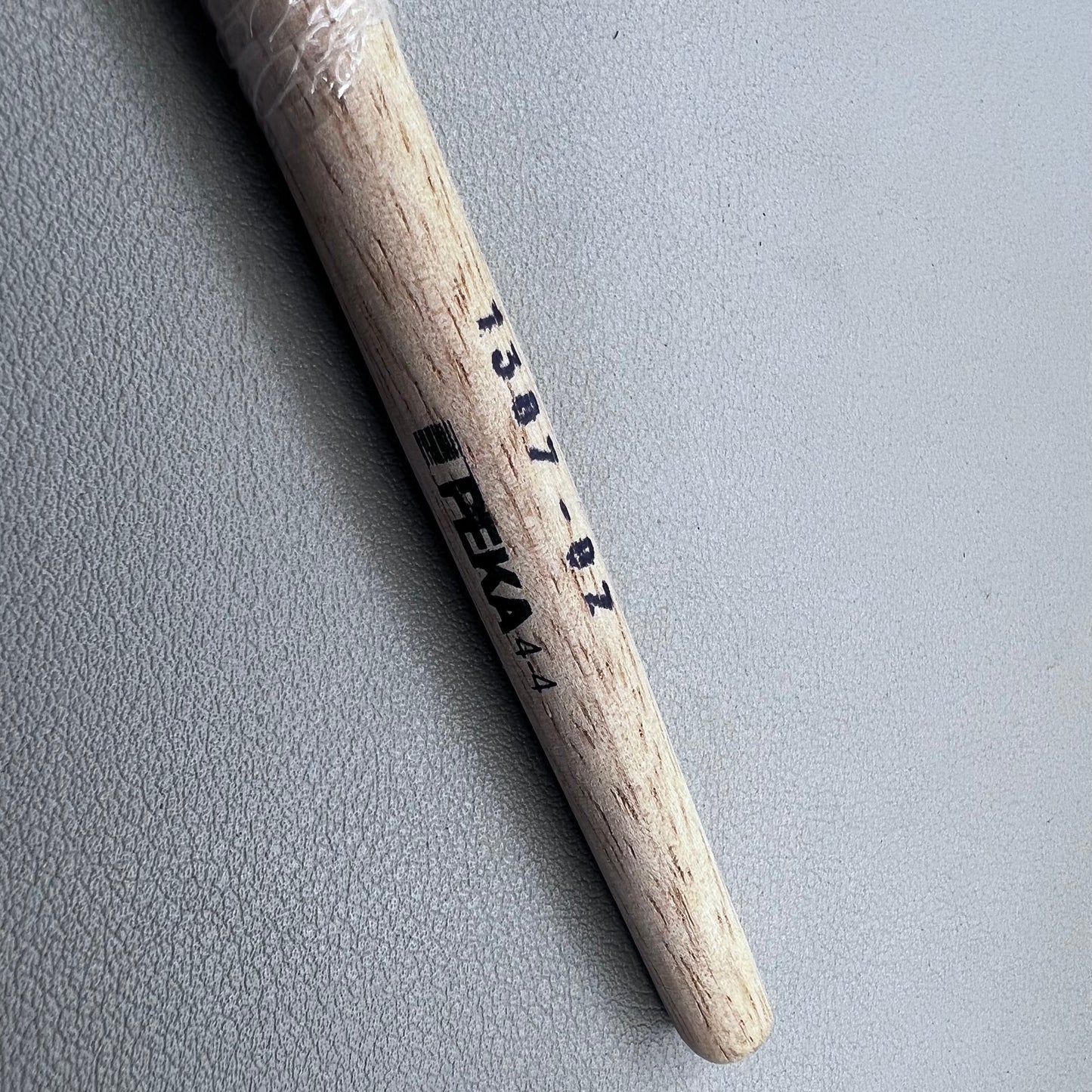 Swiss Bergeon 1307-02 white bristle brush for delicate watch cleaning and maintenance.