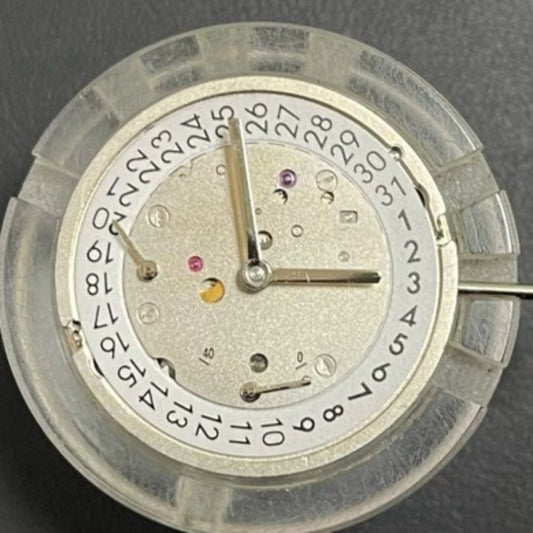 ETA 7750 automatic chronograph movement with day-date at 3 o'clock, precision watch mechanism.