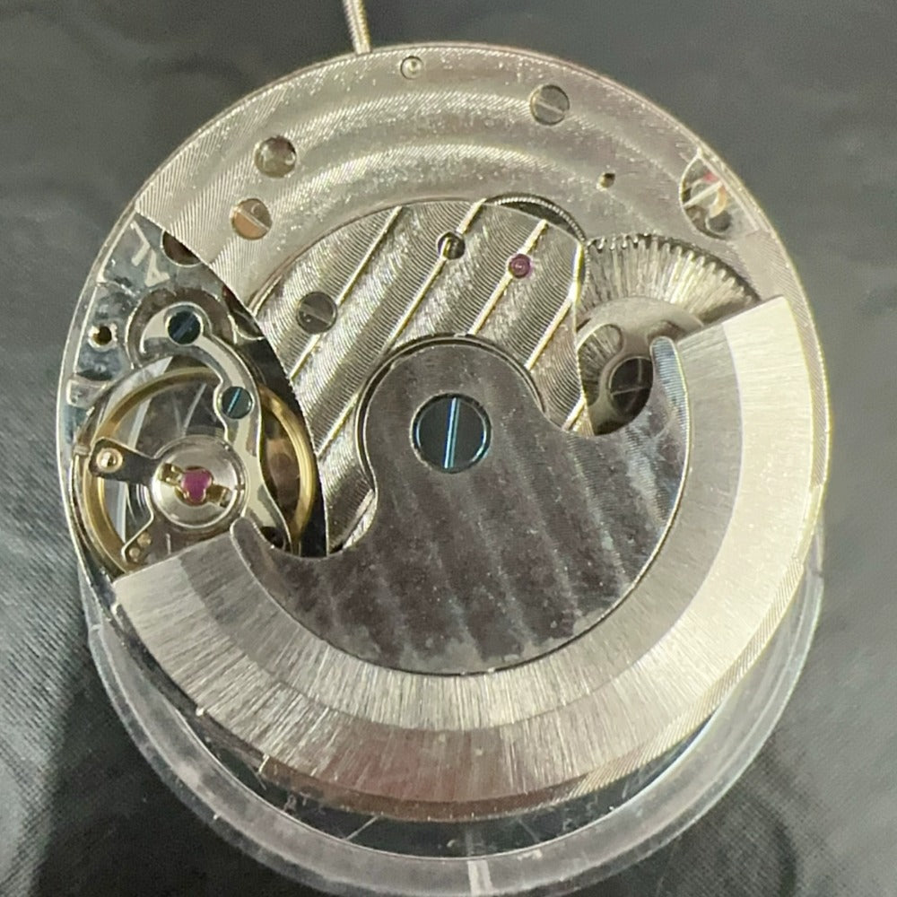 Hangzhou 2837 watch accessory showcasing automatic mechanical movement with flywheel and small second detail