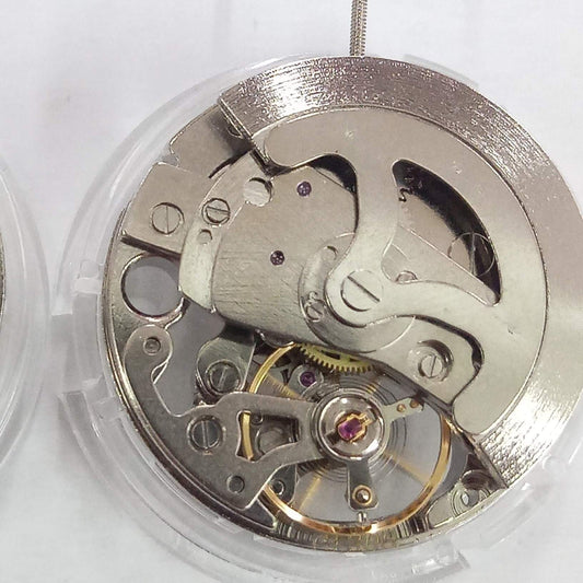 Dandong 7120 silver hollow watch part showcasing mechanical movement and 3 hands design