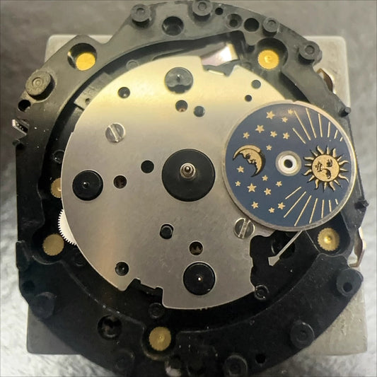 Original Japan Made VD59 quartz watch movement showing small second hands at 6, 9, and 12 o?clock positions.