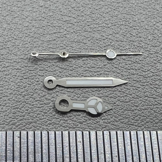 1. Silver-trimmed green lume watch hands set for NH05 NH06 movements.