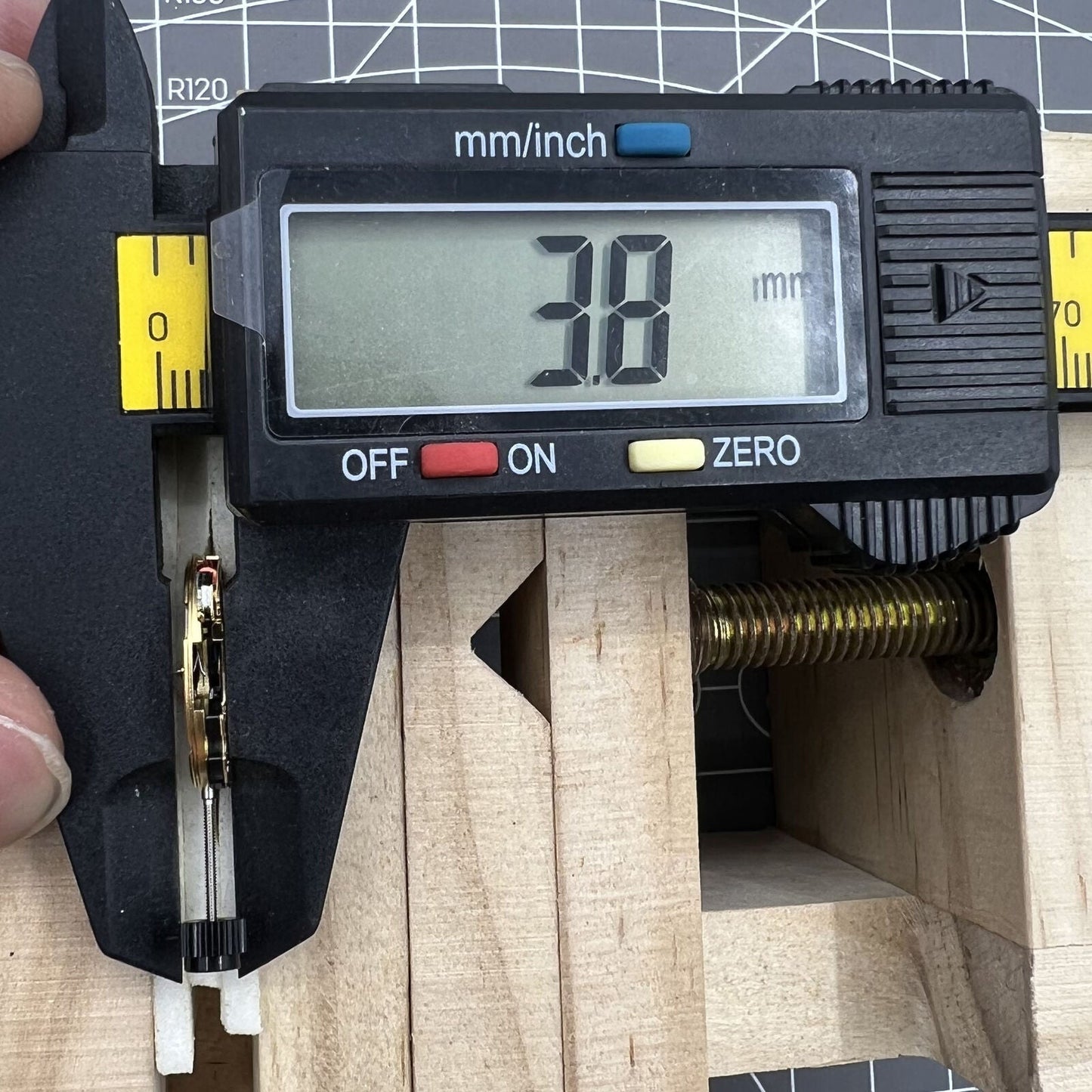 ETA F03.115 quartz watch movement showing 3 hands and date display at 6 o'clock, precision by ETA brand.