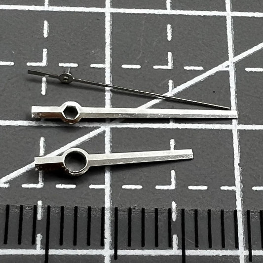 Set of silver no-lume watch hands by Miyota for 31mm 8285 movement dials, perfect for refurbishing watches.