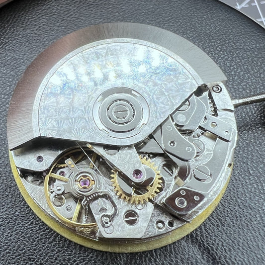Swiss Made China 7750 automatic chronograph movement with ETA 7753 configuration, showing detailed 3, 6, and 9 o'clock subdials.