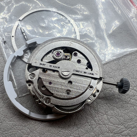 Japanese Miyota 8245 automatic mechanical watch movement with silver hollow 2-hand design.