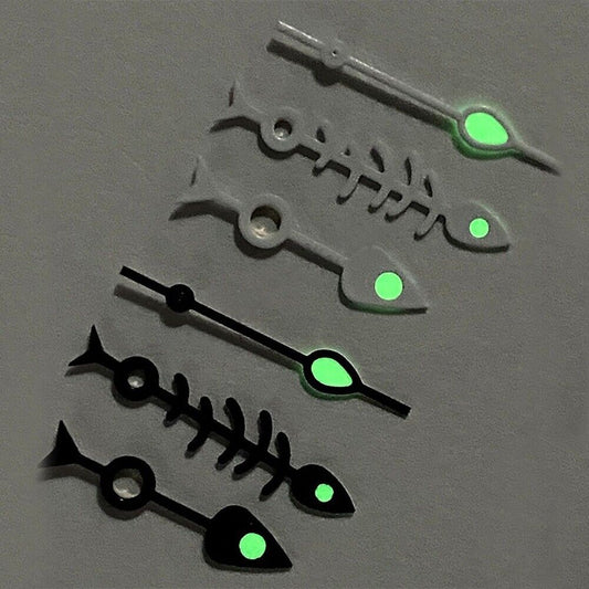 Matted black fish bone watch hands with white trim and green lume, compatible with NH35 NH36 movements.
