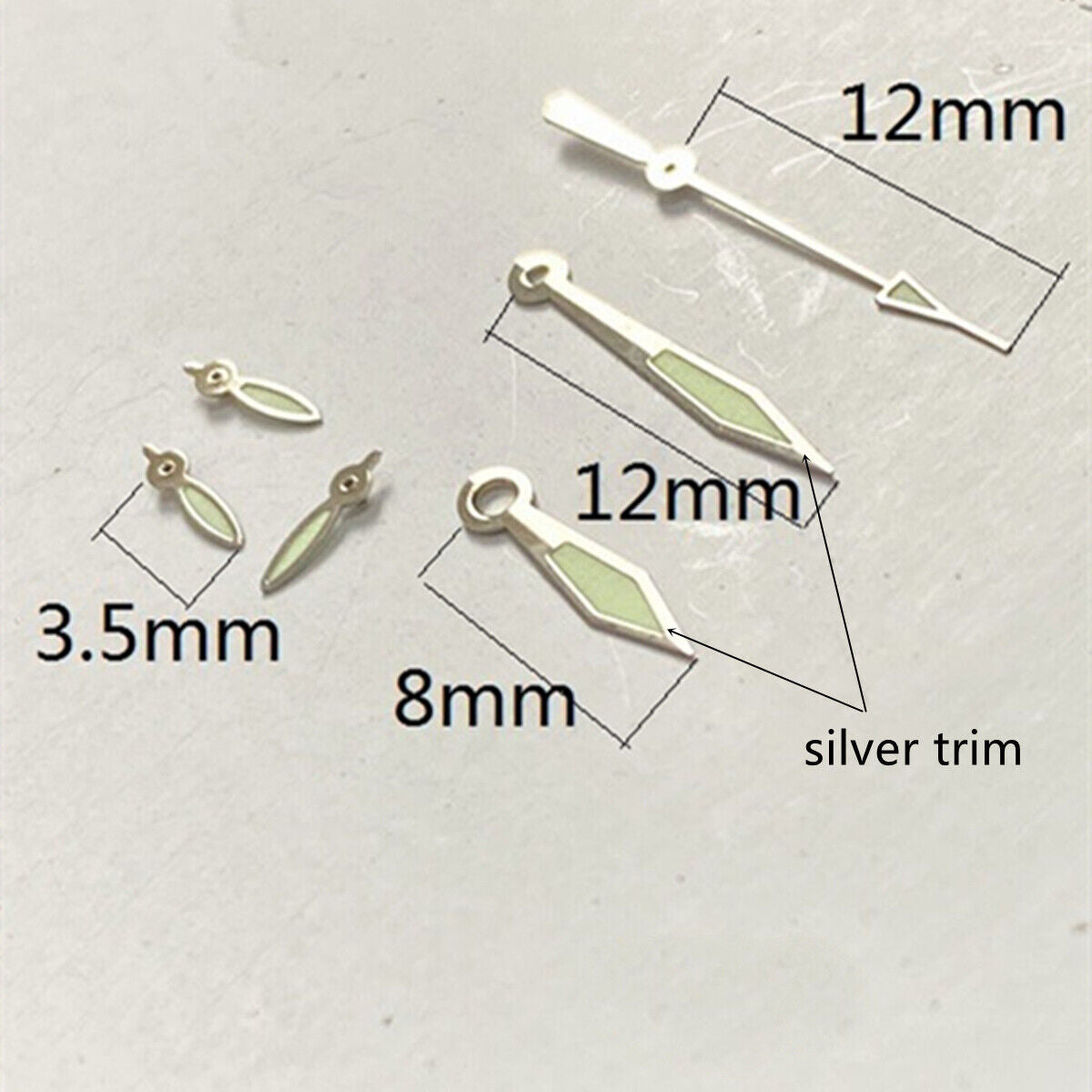 Aiguille de montre 12 mm en forme de diamant avec finition argentée et luminescente verte pour mouvement VD53, VD54 et VD57