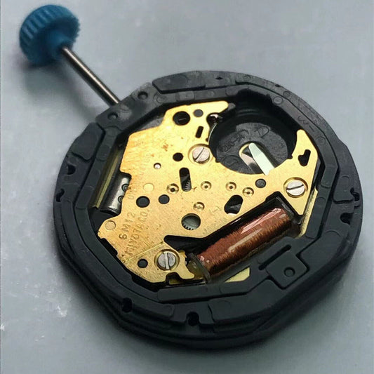 Miyota 6M12 quartz watch movement with date at 3 o'clock, precision Japanese craftsmanship.