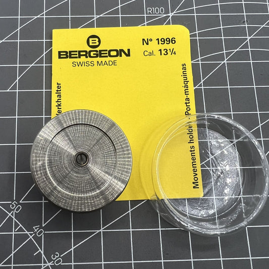 Bergeon 1996 13 1/4 watch movement holder with adjustable hollow center screw for precise repair.