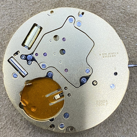 Swiss Made Ronda 7004P quartz watch movement with gold gilted finish, precise 3 hands design.