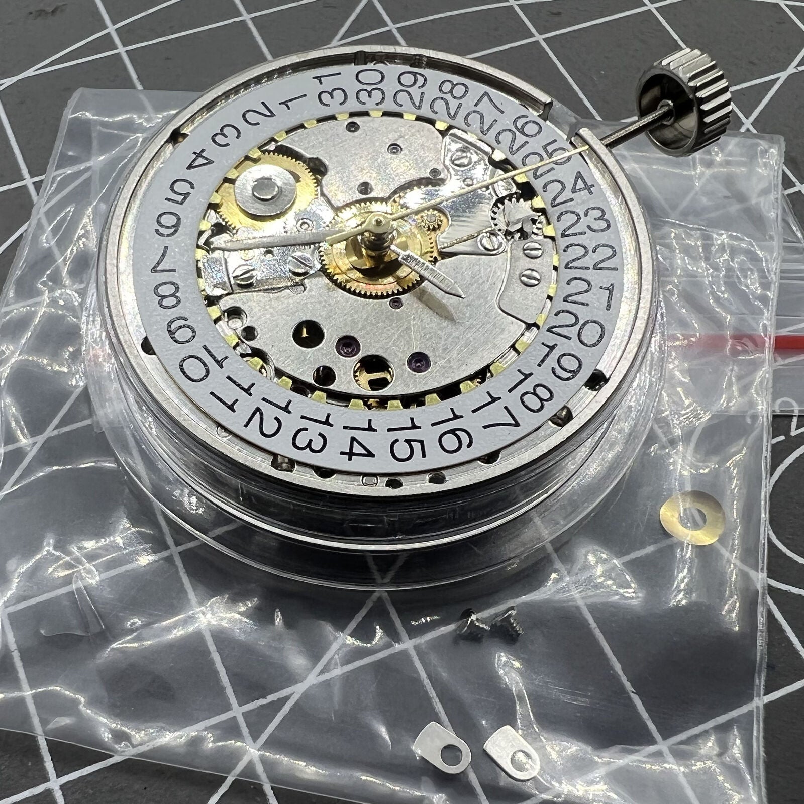 Hangzhou Golden Rotor mechanical watch movement with single calendar feature and visible intricate gears for precision.