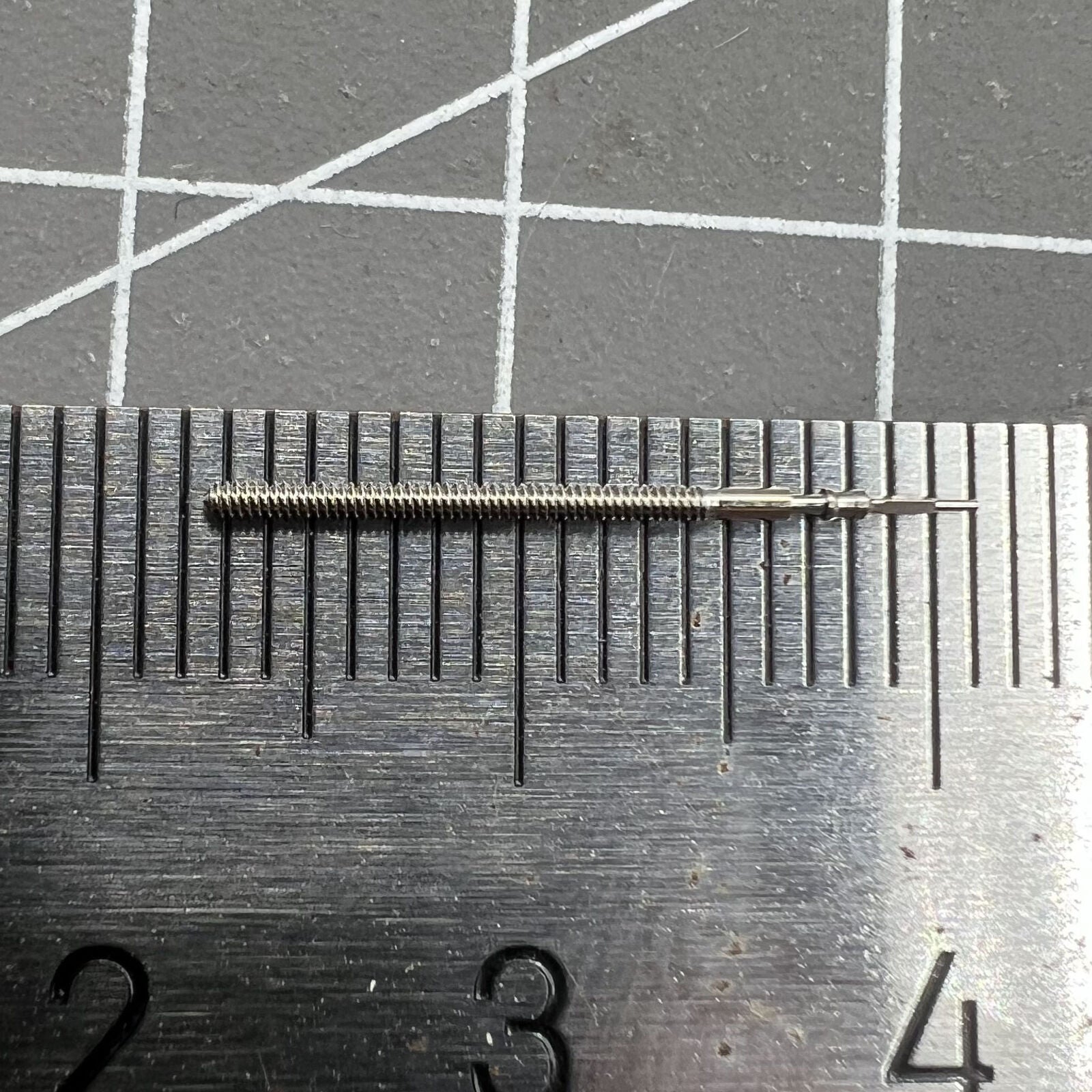 Replacement watch winding stem compatible with Miyota JS00 and JS20 movements for precise repairs.