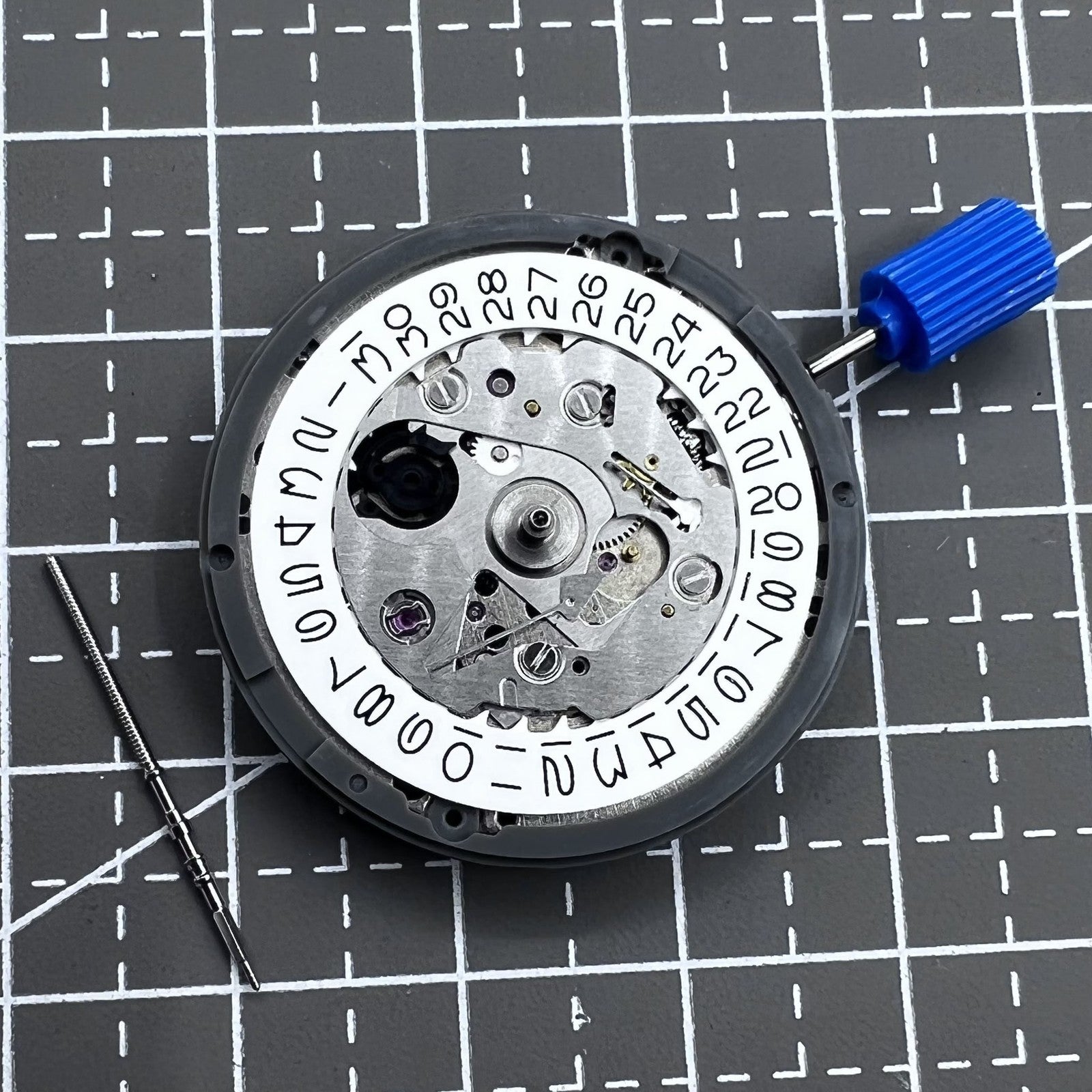 Seiko NH35 automatic watch movement with white dial, high accuracy for precise timekeeping.