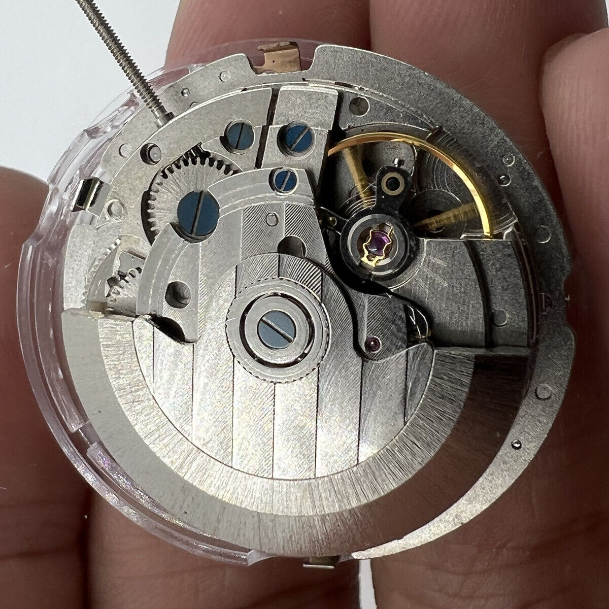 China Made Mechanical Automatic watch with 3 hands, big date at 12, multi-function dials.