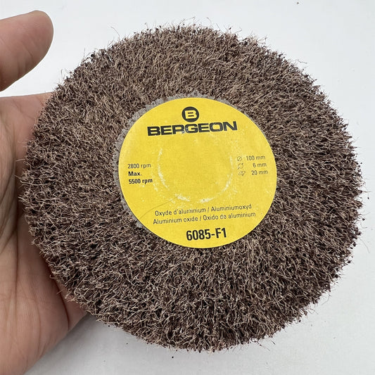 Bergeon 6085-F1 medium grit abrasive wheel polishing brush for watch accessory maintenance.
