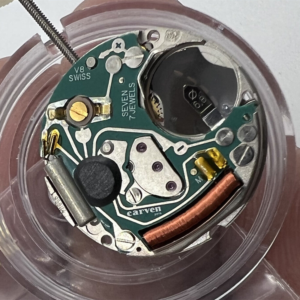 ETA 956.114 quartz watch movement with white dial, 3-hand design by ETA for accurate timekeeping.