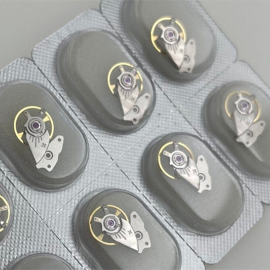 Sealed Japan-made watch balance wheel with splint for Miyota 9015 movement.