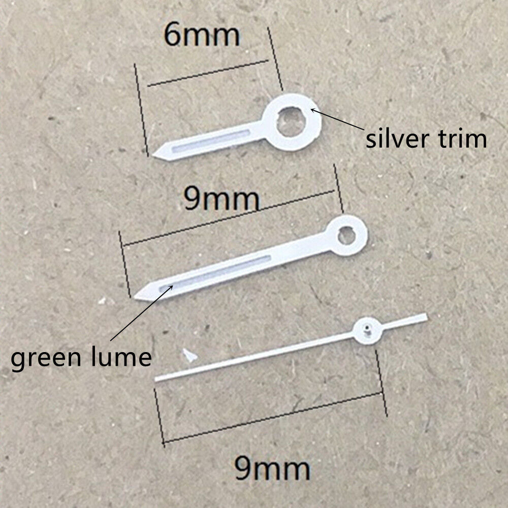 9mm silver-trimmed green lume watch hands for Miyota 1M12 movement, precise replacement parts.