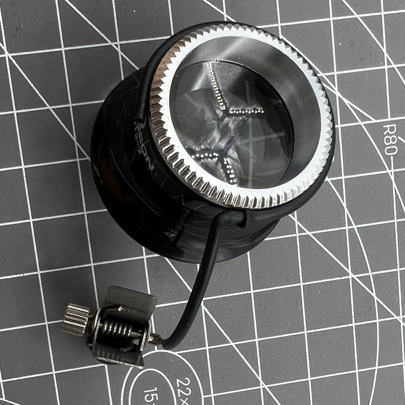 Swiss Bergeon watchmaker eyeglass with clip, magnification X3.3 X4 X5 for detailed watch repair tasks.