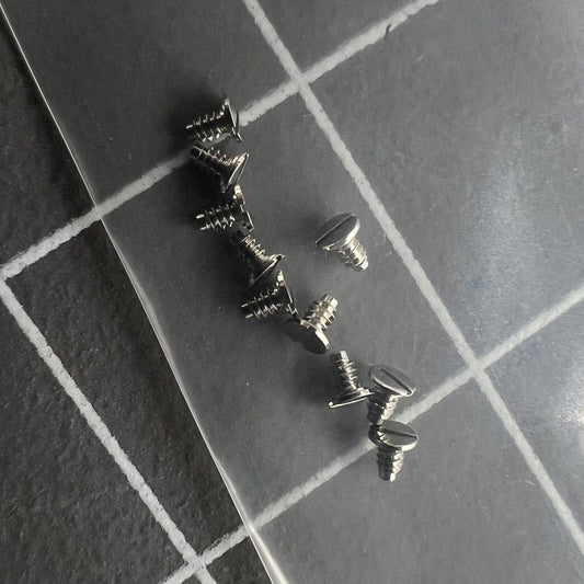 Intermediate Date Wheel Cover Screws for ETA 2824/2836 movement, precision watch accessory.