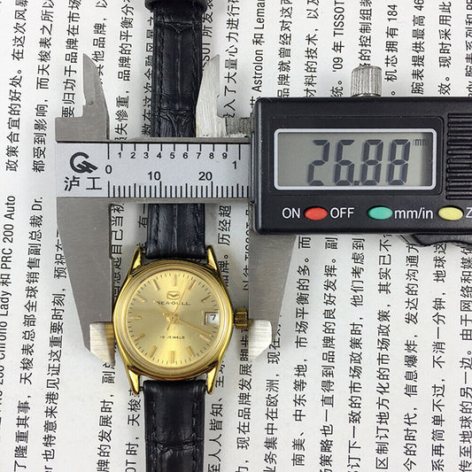 Golden dial lady watch by Seagull, Tianjin Factory, 19 jewels manual mechanical movement.