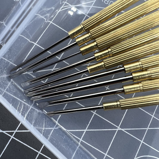 1. Precision 9-piece steel watch repair screwdriver set with 0.8-1.8mm tips for detailed watch adjustments.