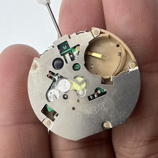 Sunon PE60 quartz watch movement with 3 hands and date at 6 o'clock, precise timekeeping.