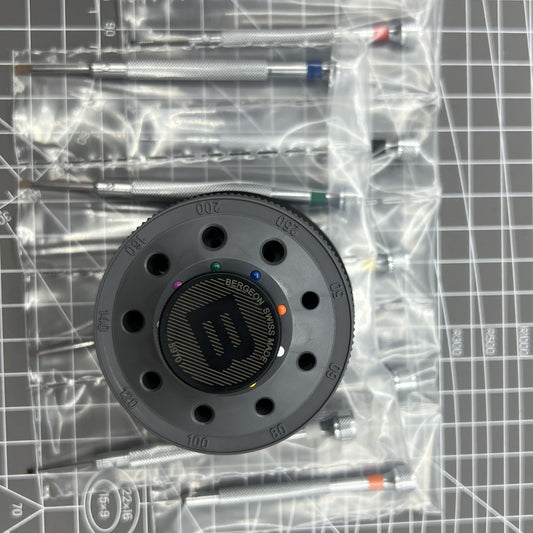 Swiss Made Bergeon 5970 rotating screwdriver set with 9 precision screwdrivers for watch repair.