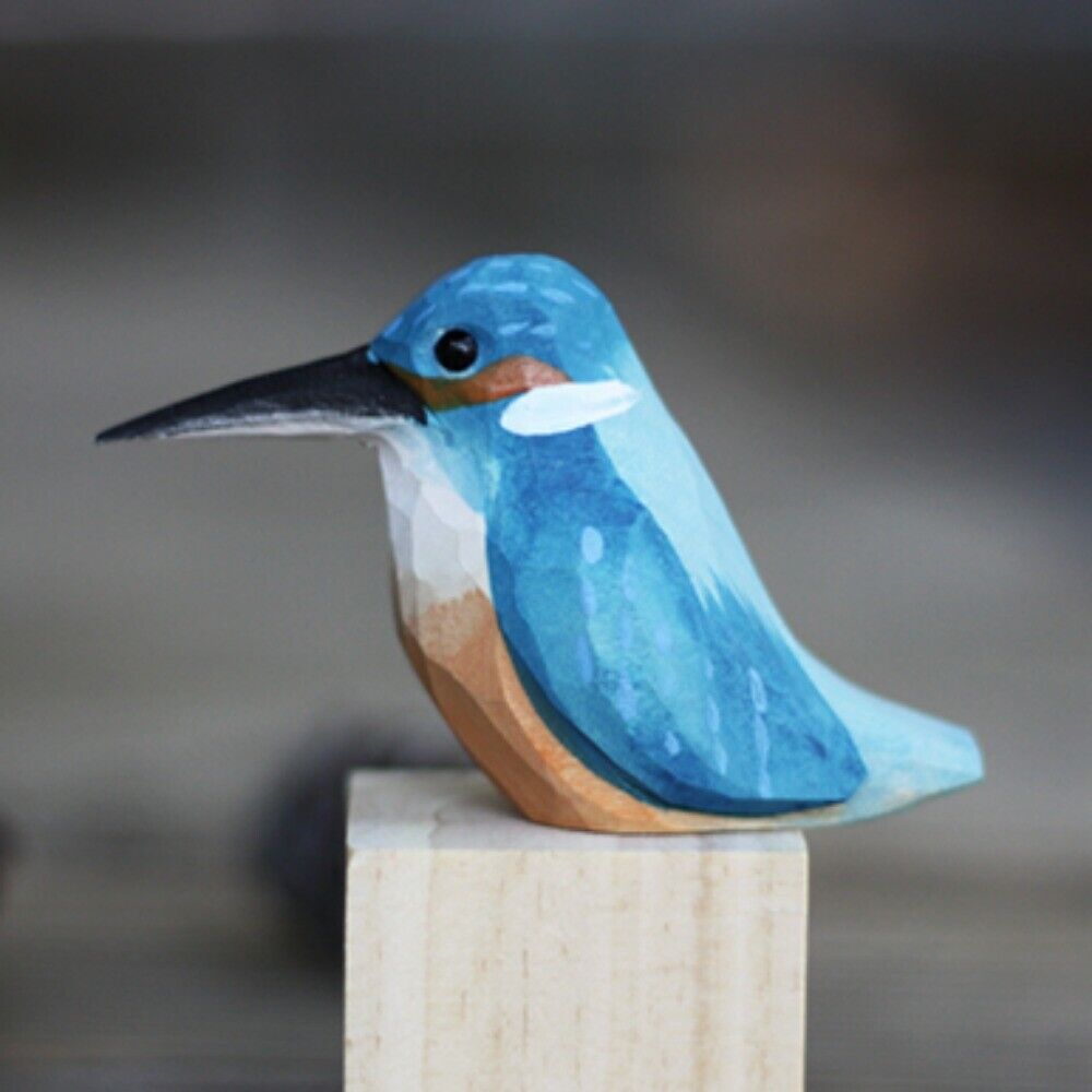 Handmade blue bird wooden figurine, perfect collectible art for home decor and display.