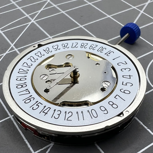 Ronda 5030D quartz watch movement with date at 6, Swiss parts for precise timekeeping.
