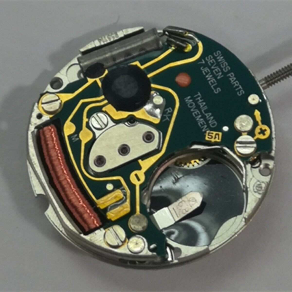 ETA 956.114 quartz watch movement with white dial, three-hand design by ETA for accurate timekeeping.