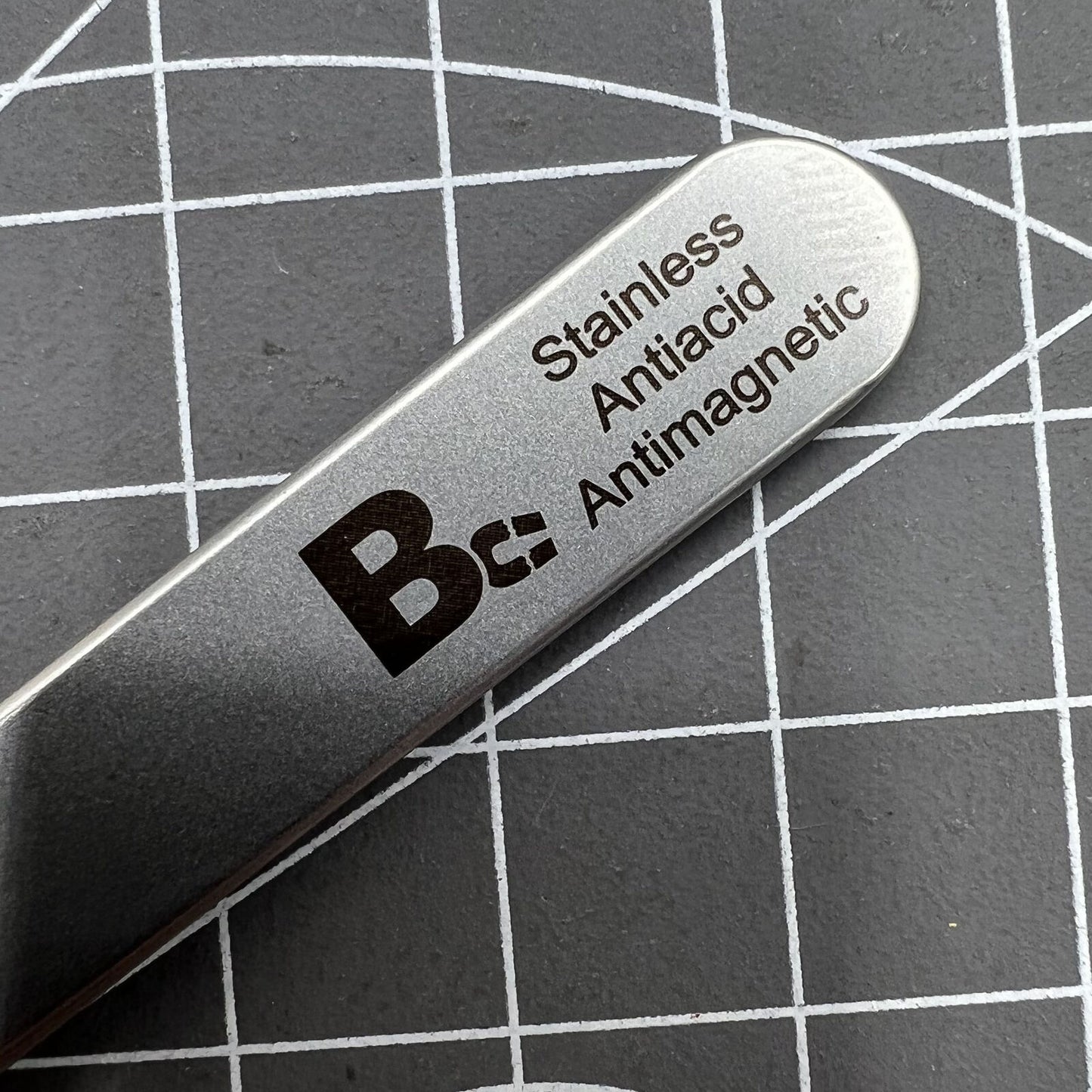 Bergeon 7026-3 antimagnetic tweezer for precise hairspring handling in watch repair tools.