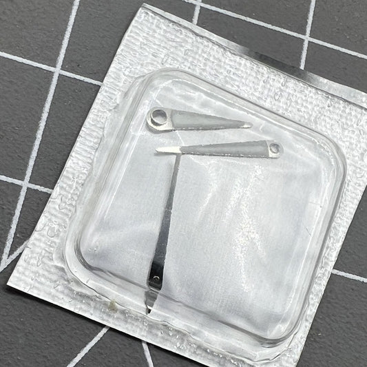 Silver trim pointed green luminous watch hands for Epson VJ32 movement, glowing in low light, precise fit.