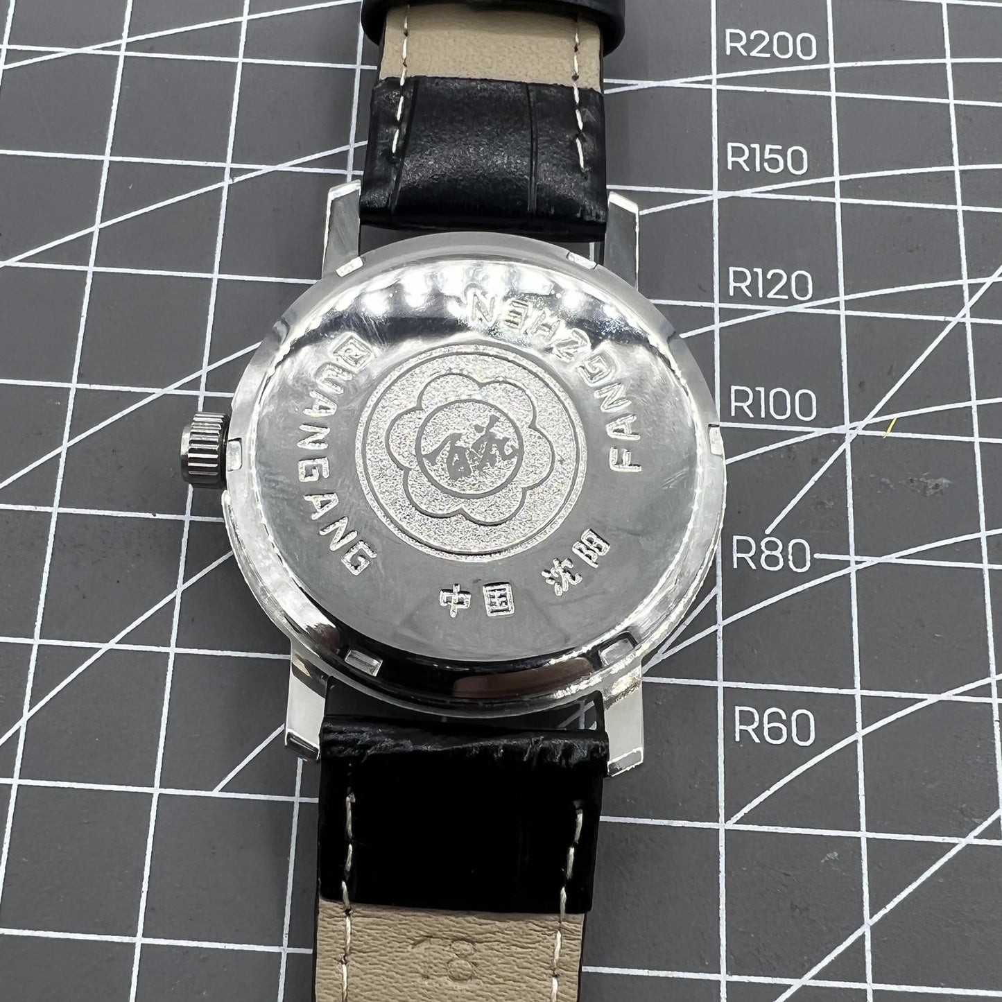 China Baihua 37mm manual watch with silver dial, 19 jewels, shock-resistant for lasting durability and style