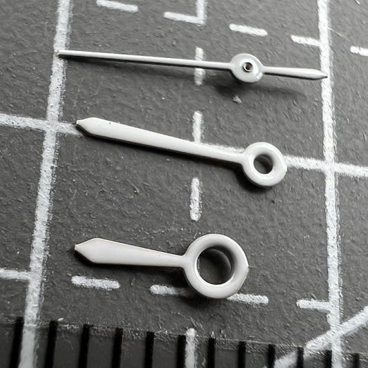 6mm white watch hands set for quartz Epson TMI VJ22 movement, no lume, precise timekeeping accessory.