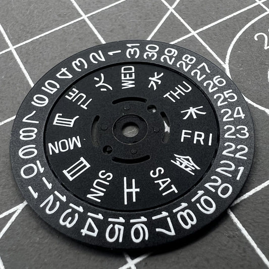 Green lume date and week wheels for NH36 movement, showing date at 3.8, precision watch accessory.