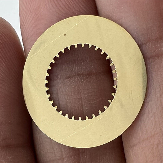 White date disk wheel showing date at 3 o'clock for Ronda 705 quartz watch movement.