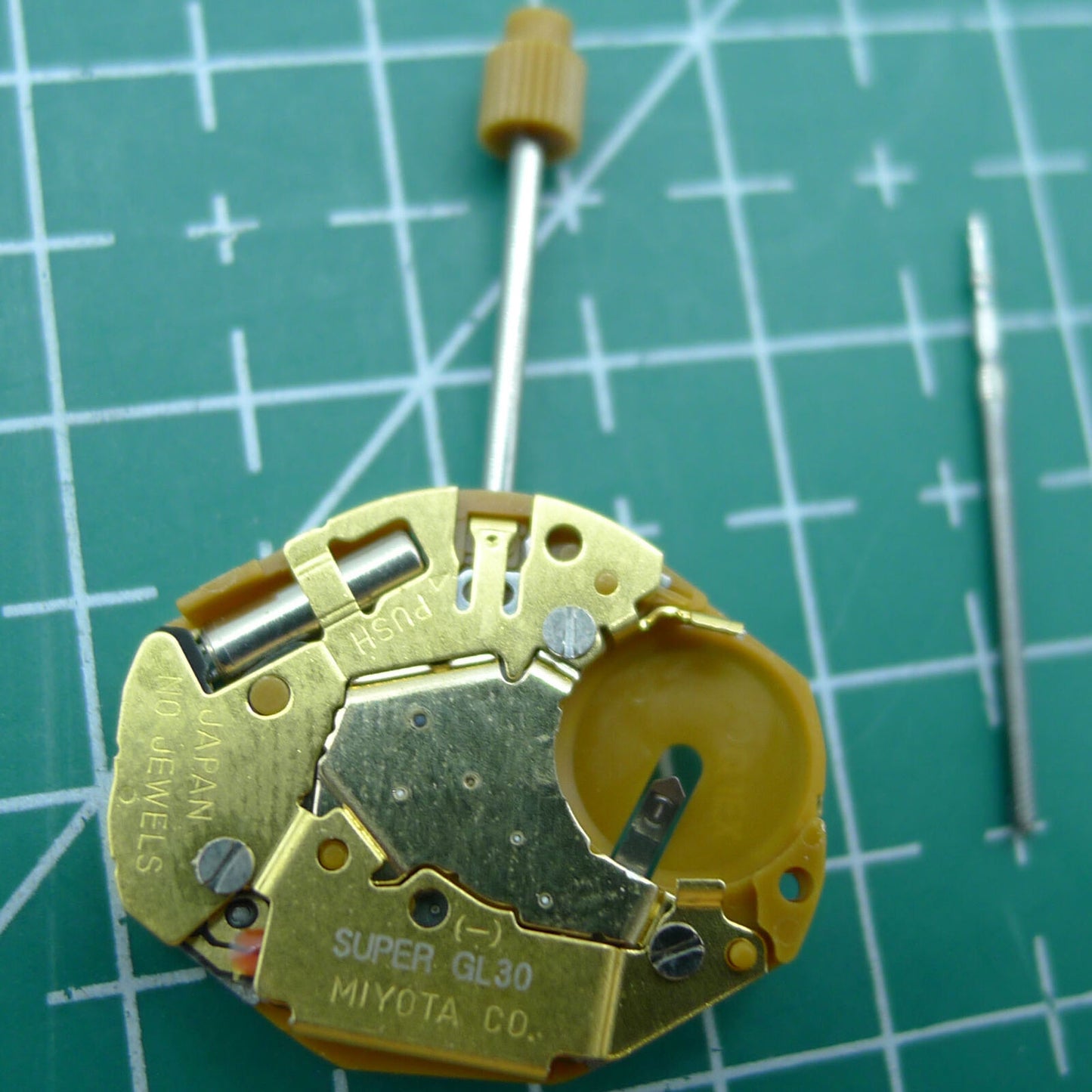 Miyota GL30 quartz watch movement with three gold hands, Japan-made precision timekeeping by Miyota