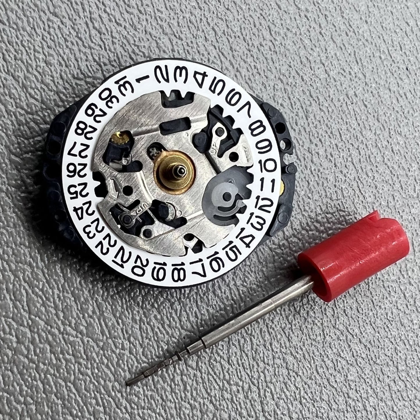 Seiko 7N82D quartz watch movement for accurate, durable timekeeping in watch accessories.