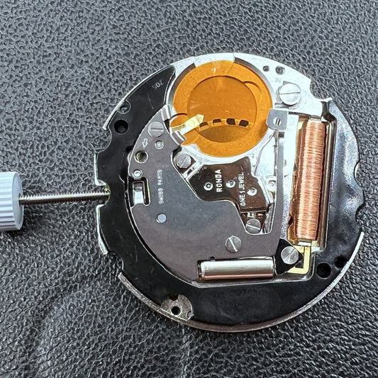 Swiss Ronda 705 quartz watch movement with date display at 6 o'clock, ideal for precise timekeeping.