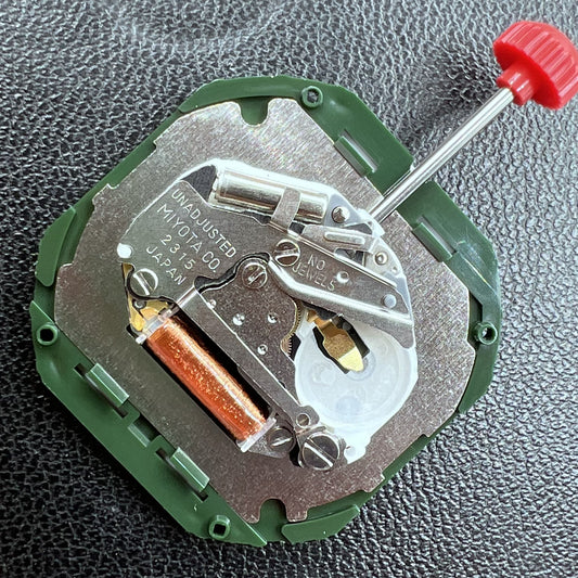 Japan Miyota 2315 quartz watch movement with 3 hands and date at 6, including watch stem for precise timekeeping.
