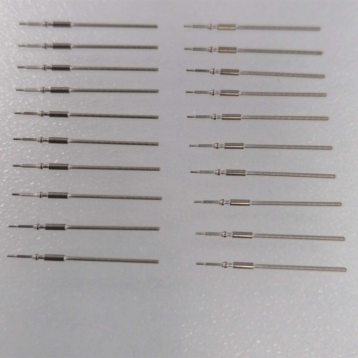 Watch winding stem compatible with OR15 movement, durable and precise replacement part.